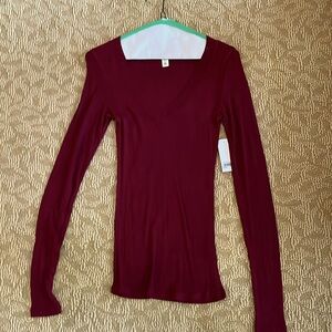 Woman’s Red Tibetan v neck top